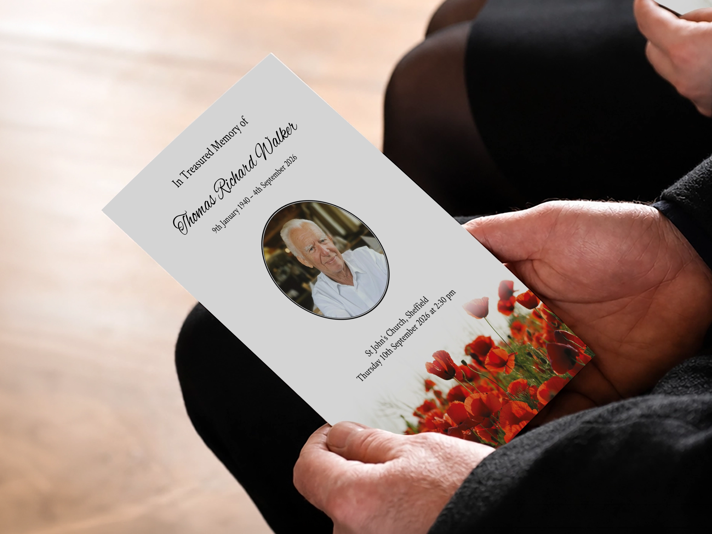 [Photograph — finished order of service booklets, stacked]